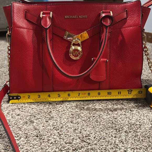 Large Michael Kors handbag with gold accents. - Picture 2 of 6